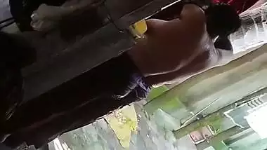 Son captures mom bathing in open backyard viral MMS