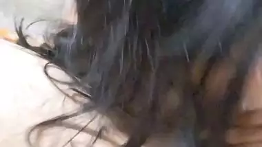 GF with smiling face gives blowjob to boyfriend