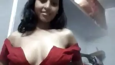 Sexy girl making striping video for lover